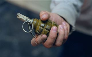 Казахстанец ограбил российский банк с гранатой в руках