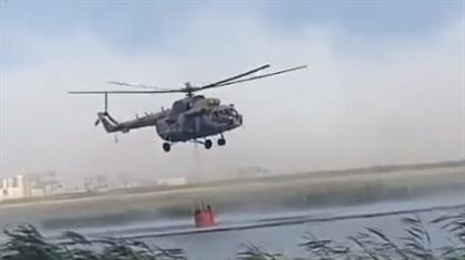 К тушению пожара в Астане привлечены два вертолета 