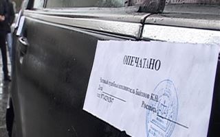 У должников по налогам изъяли два авто в Алматы