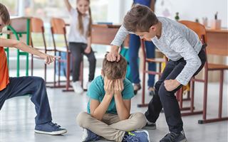 Детский психолог назвала признаки школьного буллинга