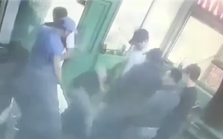 Групповое избиение казахстанца попало на видео