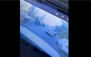 В Алматы автомобиль догнал и сбил водителя скутера - видео