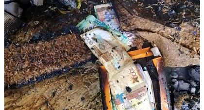 На пепелище торгового дома в Павлодаре пожарный нашел пачку денег