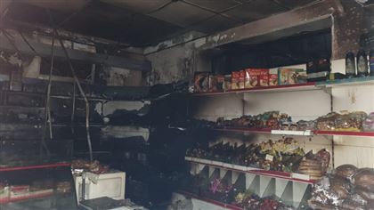 Сотрудницу спасли из горящего магазина в Алматы