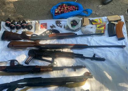 Два мешка оружия нашли на одной из улиц Алматы
