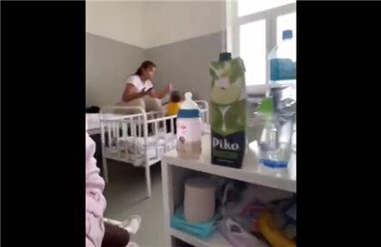 В больнице Шымкента засняли на видео, как мать бьёт своего маленького ребёнка